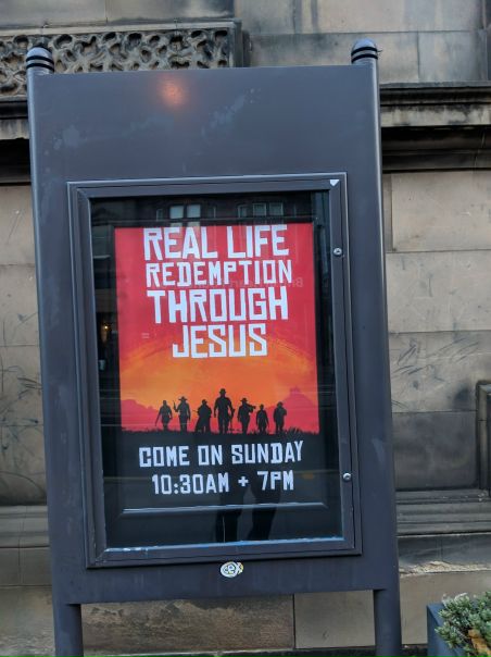 У одной из эдинбургских церквей сейчас висит такой плакат с призывом при помощи Иисуса искупить свои грехи. 