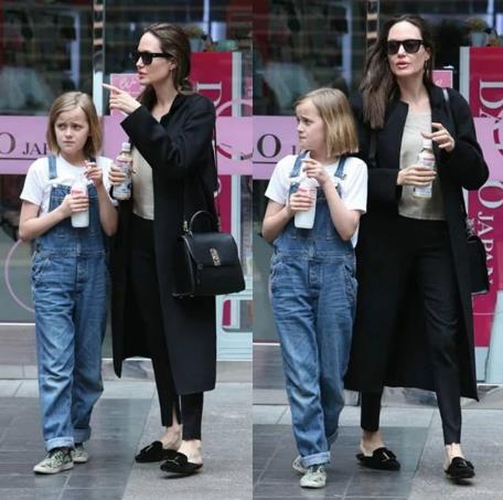 Анджелина Джоли на прогулке с дочкой.